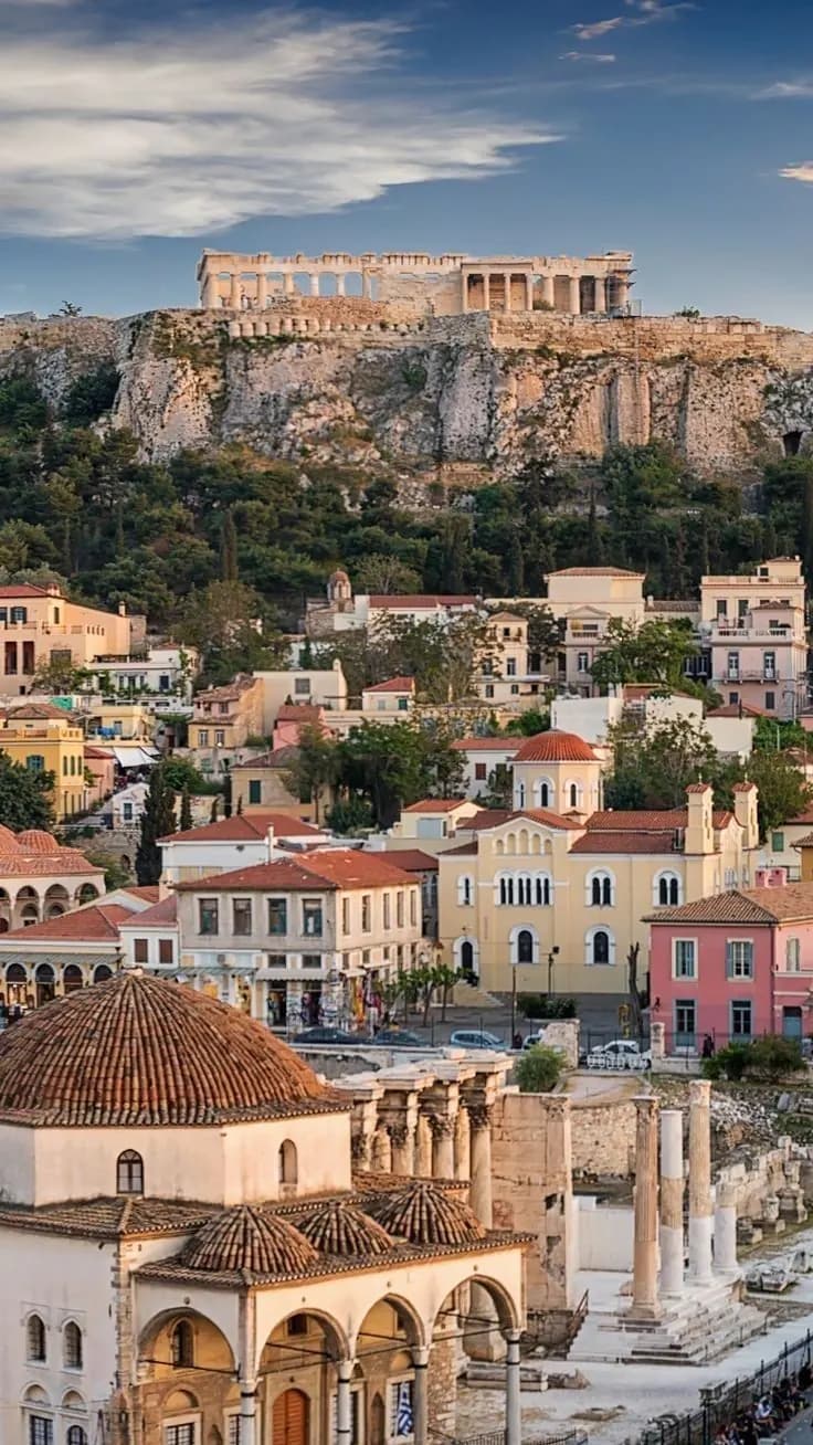 Tours in Greece — white and blue houses by the sea